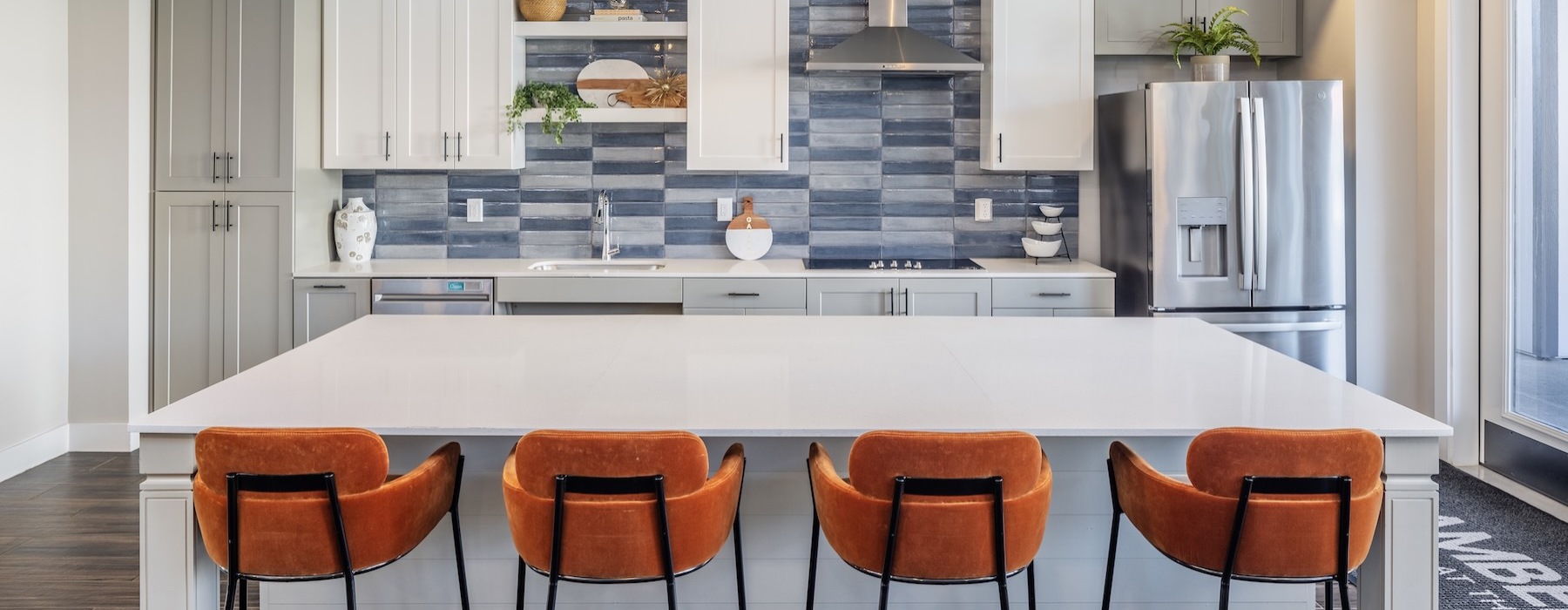kitchen with an island and chairs