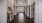 a hallway with a chandelier