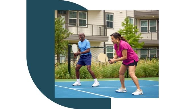 a couple playing pickleball